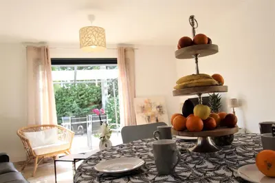 a table with a pile of fruit on top of it at Les Bastidons de l'Isle - Le Seguret - 3 étoiles in LʼIsle-sur-la-Sorgue