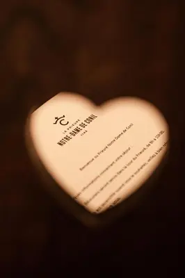 a white heart with a piece of writing on it at Prieuré Notre-Dame de Conil - 12e siècle in Rognes