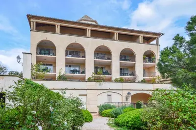 an external view of a building with plants at Village Pont Royal en Provence - maeva Home - Appartement 2 pièces 6 personnes Sélection MAE-7984 in Mallemort
