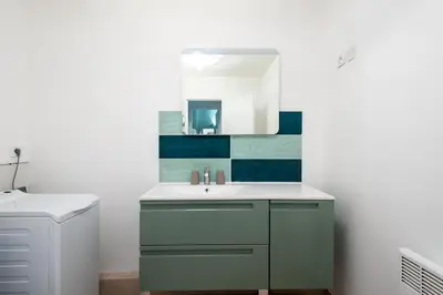 a bathroom with a sink and a mirror at Village Pont Royal en Provence - maeva Home - Appartement 2 Pièces 6 Personnes - Sélection MAE-9534 in Mallemort