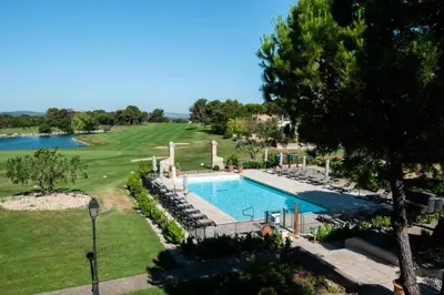 an image of a swimming pool at a resort at Résidence Hôtel du Golf de Pont Royal - maeva Home - Appartement climatisé ravissant 2 pièces 4 personnes - Prestige - super Home MAE-3104 in Mallemort