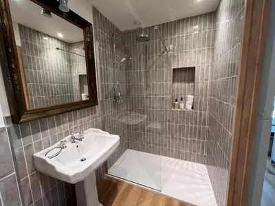 a bathroom with a sink and a mirror at La Chapelle sur la Sorgue in LʼIsle-sur-la-Sorgue
