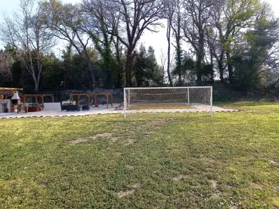 a soccer field with a goal in a park at Appartement charmant à Avignon, 45 m² avec piscine partagée in Avignon