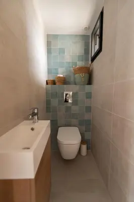 a bathroom with a toilet and a sink at MAISON LAVANDE du MAS LOU CAPY in Salon-de-Provence
