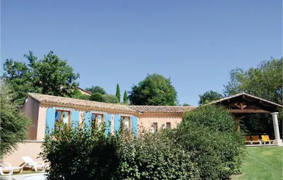 a villa with a view of the garden at Amazing Home In Roussillon With Wifi in Roussillon