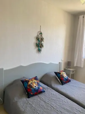 two beds in a bedroom with two pillows on them at Bastidon les Demeures du Ventoux in Aubignan