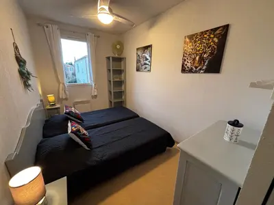 a small bedroom with a bed and a window at Bastidon les Demeures du Ventoux in Aubignan