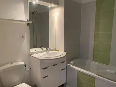 a bathroom with a sink and a toilet and a tub at Bastidon les Demeures du Ventoux in Aubignan