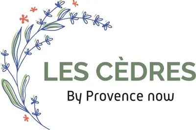a sign with flowers and the words less cedars by powerhouse now at Provence Now in Cabrières-dʼAvignon