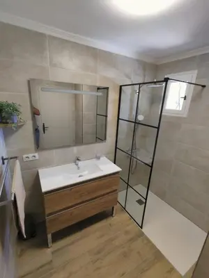 a bathroom with a sink and a shower at The Blue Tit - private swimming pool in LʼIsle-sur-la-Sorgue