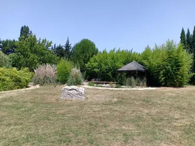 a gazebo in the middle of a field at Instant Parfait en Provence Chambre privée et piscine in Monteux