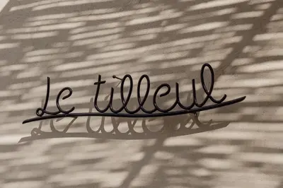 a sign that says be yourself on the side of a building at GITE LE TILLEUL in Mormoiron