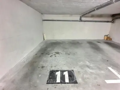 a parking lot with a number on the floor at Vaste appartement avec terrasse, parking, proche Parc Expo Avignon in Avignon