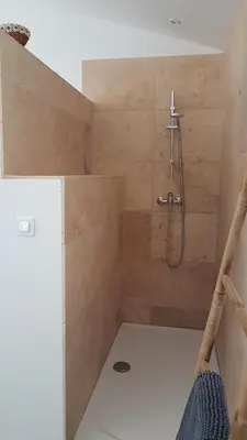 a bathroom with a shower in a room at le moulin in Crillon-le-Brave