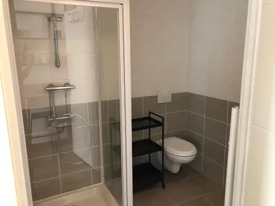 a bathroom with a shower and a toilet at Ma place au sud 1 in Éguilles