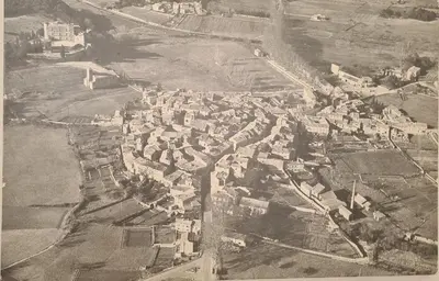 an aerial view of a city with buildings at Cocon du Papillon à Lourmarin in Lourmarin