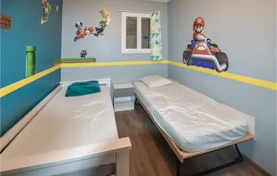 a room with a bunk bed in a room at Gorgeous Home In Puget in Puget