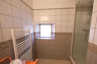 a bathroom with a shower and a window at charming provencal house with private pool for 4 people in cheval blanc, luberon. in Cheval-Blanc