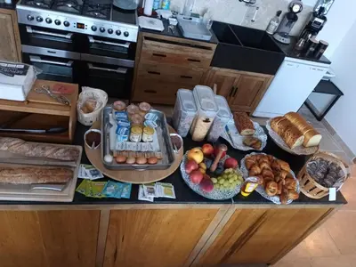 a table with many different types of food on it at BASTIDE DES MARTELIERES in Salon-de-Provence