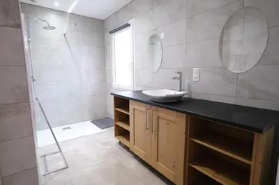 a bathroom with a sink and a shower at very pleasant villa with private swimming pool, in a residential area near the center of saint-rémy-de-provence - 8 people in Saint-Rémy-de-Provence