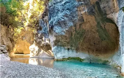 a cave with a pool of water in a canyon at Stunning Apartment In Villes Sur Auzon in Villes-sur-Auzon