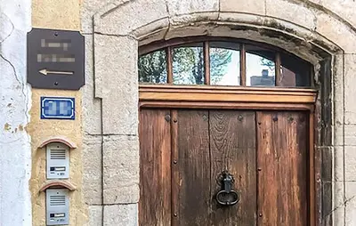a wooden door with a window on a building at Stunning Apartment In Villes Sur Auzon in Villes-sur-Auzon