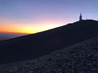a cross on top of a hill at sunset at Mas Boudeissoun - Cœur de cerise - Baignade à 600 m in Mormoiron