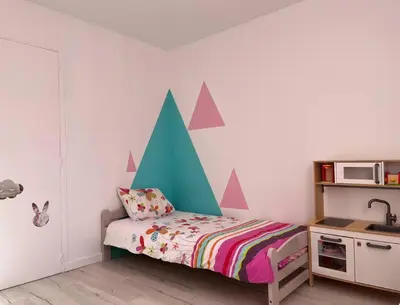a childs bedroom with a bed with mountains on the wall at Haut de villa avec piscine privée et extérieur in Lançon-Provence