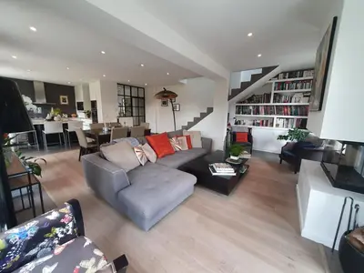 a living room with a couch and a table at Lou Pantai, House, 5 bedrooms, 8 people, AC, Pool, Large garden,4km from AIX EN PROVENCE in Aix-en-Provence
