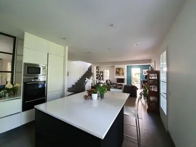 a kitchen with a white counter top in a room at Lou Pantai, House, 5 bedrooms, 8 people, AC, Pool, Large garden,4km from AIX EN PROVENCE in Aix-en-Provence