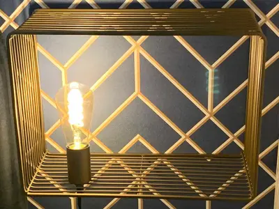 a light in a lantern hanging on a wall at Le Cabanon de Livia avec piscine privée in Cucuron