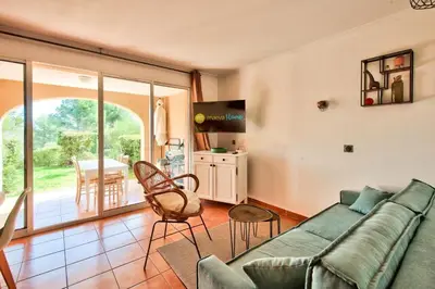a living room with a couch and a table at Village Pont Royal en Provence - maeva Home - Appartement cosy et climatisé 2 pièces 5 personnes avec jardin - Prestige - super Home MAE-2864 in Mallemort