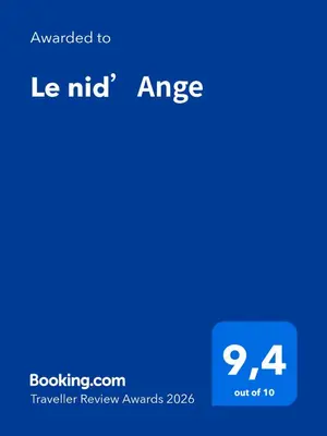 a screenshot of a cell phone with the text awarded to le nic at Le nid’Ange in Velleron