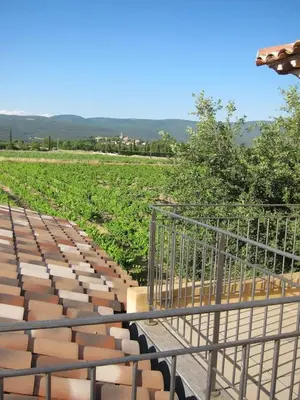 a row of bleachers in front of a field at Évasion Provençale : Villa Élégante pour 10 Personnes in Villars
