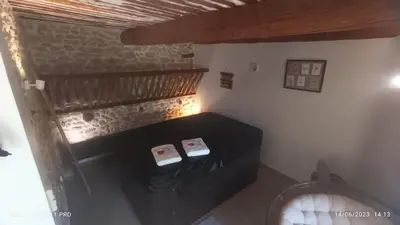 an overhead view of a fireplace in a room at L' ecurie de Florent et Spa in Cheval-Blanc