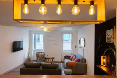a living room with a couch and a table at 