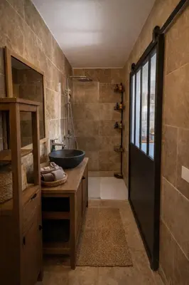a bathroom with a sink and a shower at Studio cosy à Lagnes avec Piscine au milieu des oliviers in Lagnes