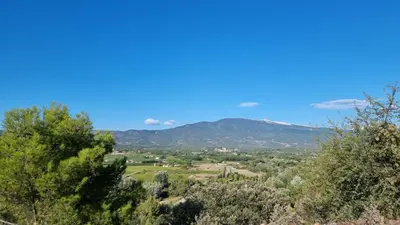 a view of a valley with mountains in the distance at Le Tavan in Crillon-le-Brave
