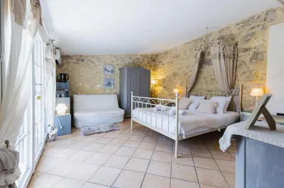 a bedroom with two beds in a room at Chambre d'hôtes - B&B - Grand Luberon chez Manon en Luberon in Lagnes