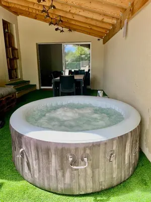 an electrical outlet on the side of a wall at Studio climatisé et tout équipé in Saint-Didier